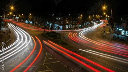 Night city traffic roundabout light trails