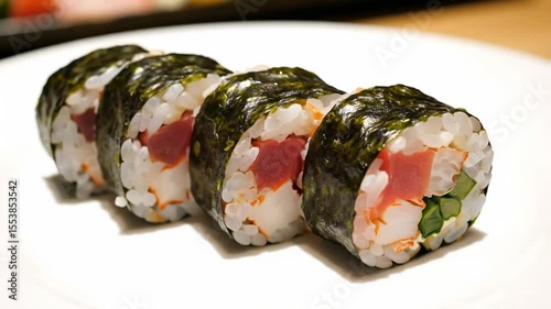 Sushi rolls on a white plate