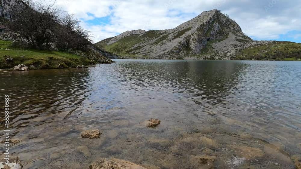 The picturesque Covadonga Lakes nestled in the Picos de Europa mountains, Asturias, Spain, offer breathtaking natural beauty and tranquility The picturesque Covadonga Lakes nestled in the Picos de Europa mountains, Asturias, Spain, offer breathtaking natural beauty and tranquility