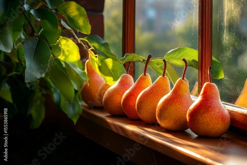 Fresh Pears Displayed on a Wooden Windowsill With Sunlight Glistening in the ...