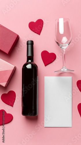 Romantic Date Setup With Wine, Chocolate Boxes, Hearts, and a Blank Card on a...