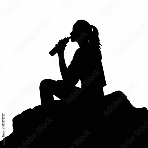Silhouette of a young woman hydrating while sitting on a rock, black and white, water bottle, wellness and fitness concept.