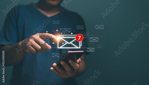 E-mail communication concept. Businessman use smartphone for new e-mail notification alert on virtual screen. Inbox receive electronic message. Internet technology. Digital marketing. Data link tech.