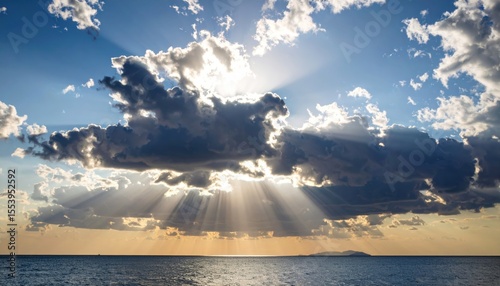 Dramatic Sunset Over Ocean With Clouds