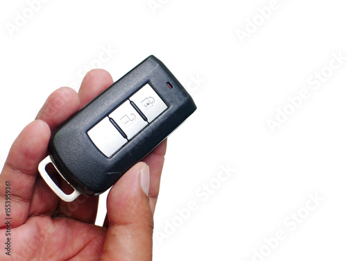 hand holding a Car Key on White Background. 