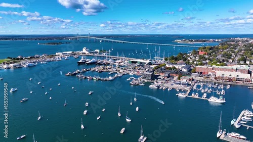 Goat Island aerial view including Goat Island Marina and Newport Harbor Island Resort with Claiborne Pell Newport Bridge at the back in Narragansett Bay, Newport, Rhode Island RI, USA. 