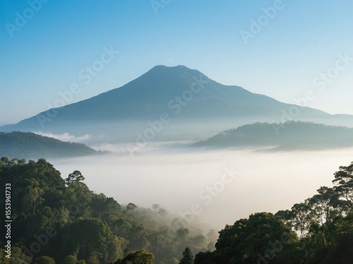 Morning Mist Covering Mount Jerai with Clear Blue Sky in Malaysia