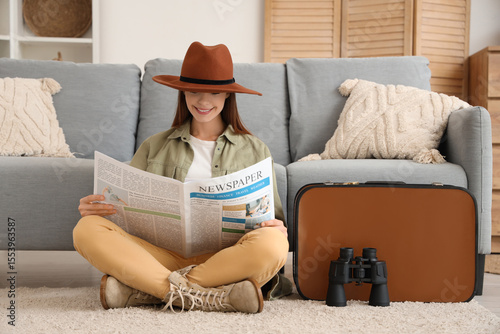 Female tourist reading news...