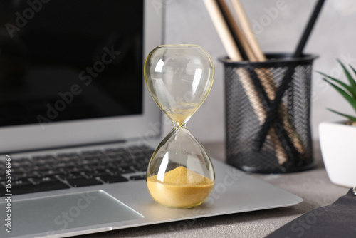 Stylish hourglass with yell...