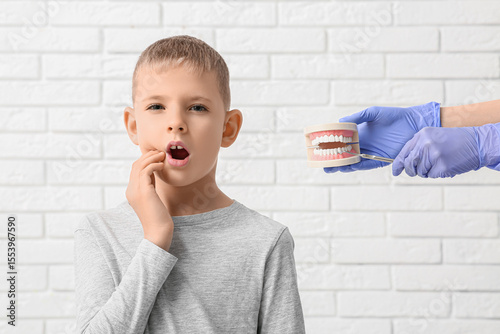 Little boy with tooth ache ...