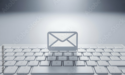 Email Concept: Keyboard and Email Symbol in White Backdrop