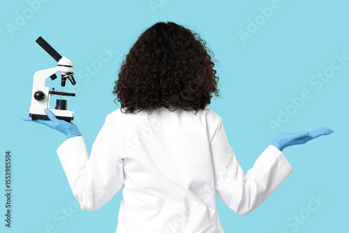 Female scientist with micro...