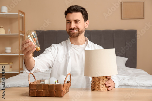 Handsome young happy man ch...