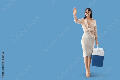 Young woman with portable f...