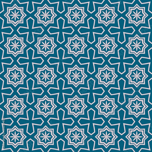 Seamless pattern with blue and white floral geometric tile design.