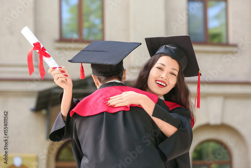 Couple of happy graduating ...