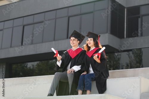 Couple of happy graduating ...