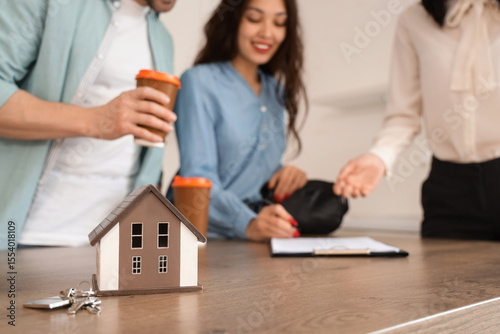 House model and keys on tab...