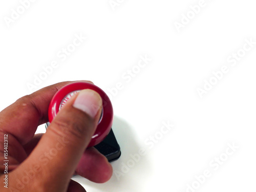 Hand Holding Rubber Stamp on White Background.