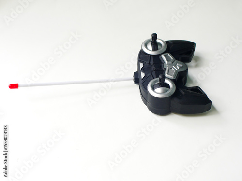 Black Remote Control (joystick) Unit on White Background.