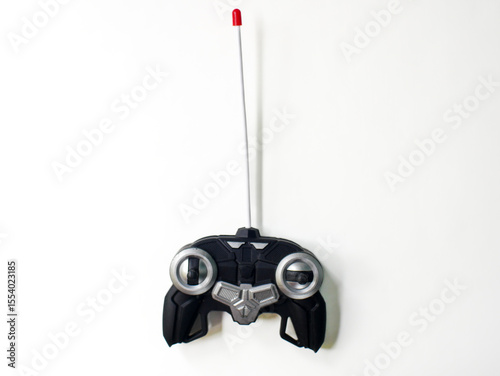 Black Remote Control (joystick) Unit on White Background.