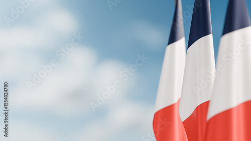 Obraz na plátně Three Flags of France, Hanging Decoratively From a Flagpole