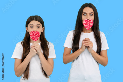 Celebrate love with daughter and mother. Family Valentines Day. Heart and love sign. Mom and child hold Heart for love. Loving girls family. Mothers Day. Love and family, Valentines.