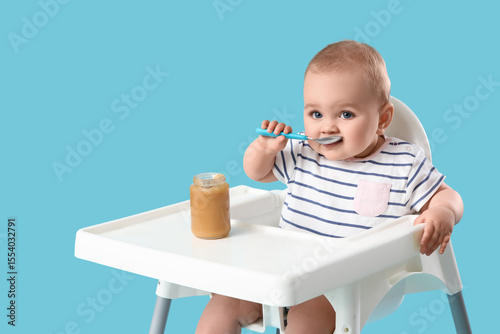 Cute little baby eating pur...