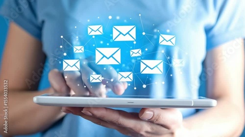 Woman uses tablet, emails network, blue background, digital communication