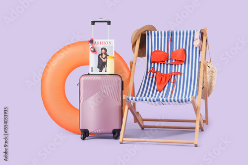 Deckchair, suitcase, swimsu...