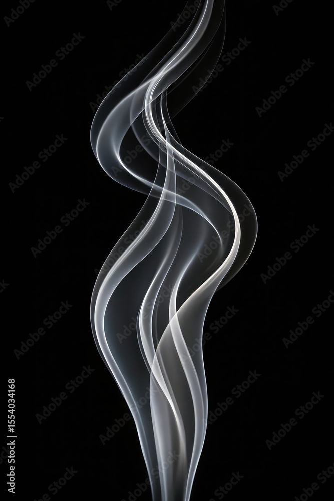 Naklejka premium Elegant swirling white smoke trails against a deep black background