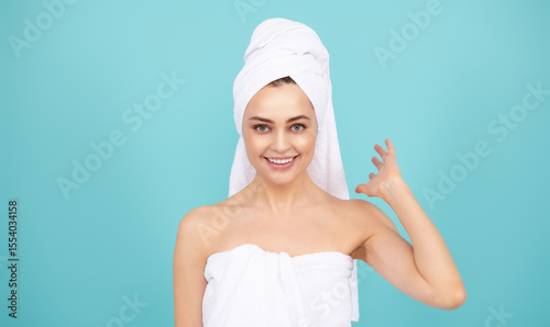 Beauty model with towel on head. Pamper your skin, facial care. Fresh and clear skin, skincare routine. Woman skincare. Beauty cosmetology. Perfect skin of beauty girl. Luxury of a beauty spa.