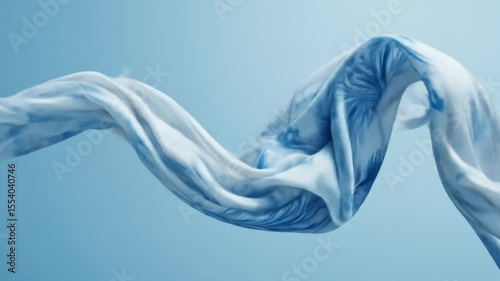 A large, lightweight silk scarf, with intricate blue and white patterns resembling feathers or botanical elements