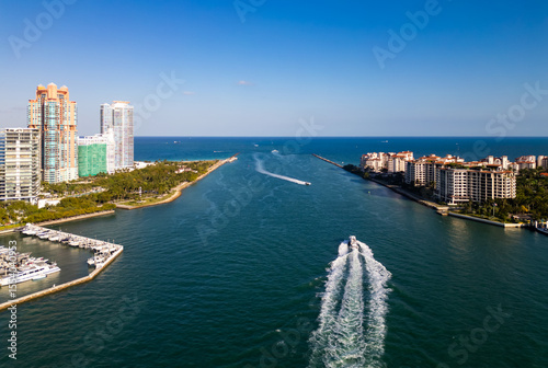 Miami Beach marina aerial drone view with skyline. Miami from above. Drone view of Miamis famous landmarks. South Pointe beach with skyscrapers. Miami city panorama. Skyline of Miami Beach.