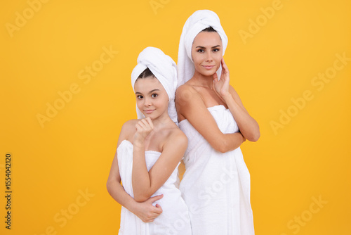 Beauty mother and daughter, embracing beauty together. Facial cosmetics family. Beautiful skin for mother. Family care and beauty. Skin cream. Natural beauty for family. Rejuvenate skin. Skin care.