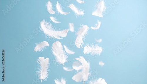 Floating White Feathers Against Light Blue Background