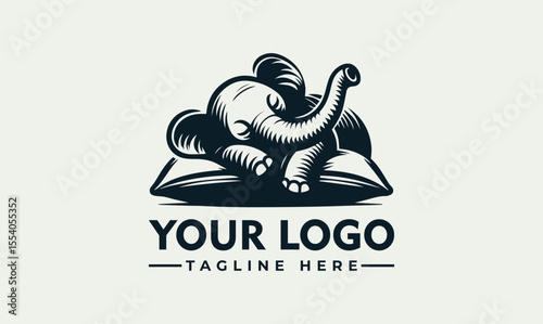 A charming logo featuring a baby elephant resting peacefully atop an open book.