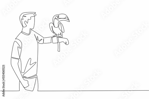 Single one line drawing toucan bird perched on hand of man. The most attractive bird in the zoo. Long orange beak. Not good at flying. Man Holding Bird. Continuous line design graphic illustration
