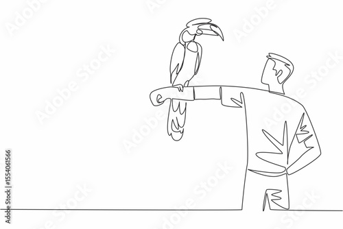 Continuous one line drawing great hornbill bird perched on hand of man. Trying to feed directly. New animal keeper on duty. Pursue hobby. Man Holding Bird. Single line draw design vector illustration