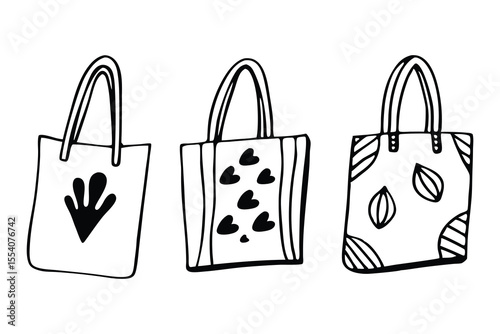 Hand drawn black and white doodle style tote bags with heart leaf and striped patterns isolated