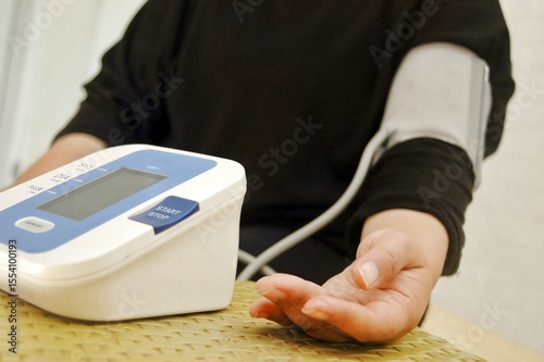 Blood pressure monitor represents healthcare, monitoring, and medical diagnostics