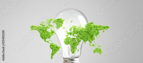Lightbulb with green world map. Green energy concept