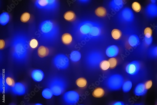 Abstract Blurry Blue and Yellow Light Bokeh Background with Festive Bokeh Effect