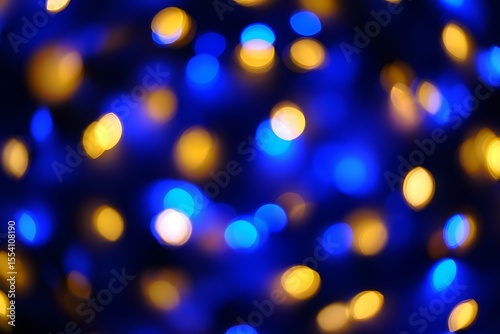 Abstract Bokeh Lights Blue and Yellow Glowing Circles on Dark Background
