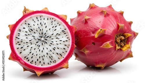 A vibrant dragon fruit displays its white flesh and black seeds, with another whole fruit adding tropical color and exotic appeal.