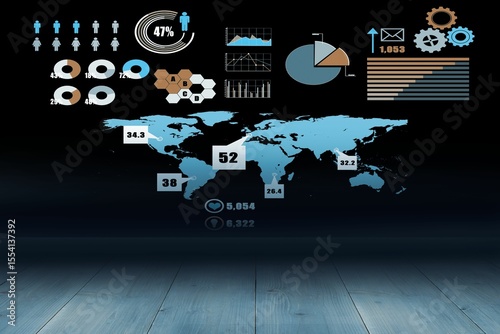 Projecting blue world map on dark wall, showing charts, infographic icons, honeycomb, counters