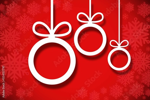 Hanging christmas decorations on red