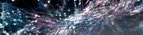Abstract fiber optic strands with bokeh lights creating a futuristic technology background look