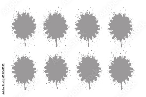 Artistic Splatters: A collection of gray paint splatters arranged symmetrically, showcasing artistic expression and raw energy. Capturing the dynamic movement and texture of liquid color.