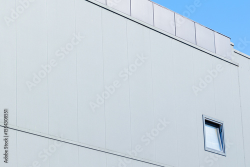 external white wall hangar building perspective facade window minimalism architecture view copy space advertising concept